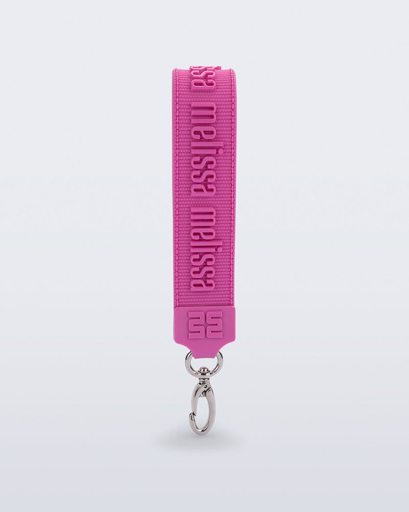 Front view of a pink M Lover Charm with the Melissa logo