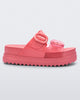 Side view of a pink Cozy Platform slide