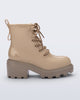 Side view of a beige Track Boot with small heel and beige laces
