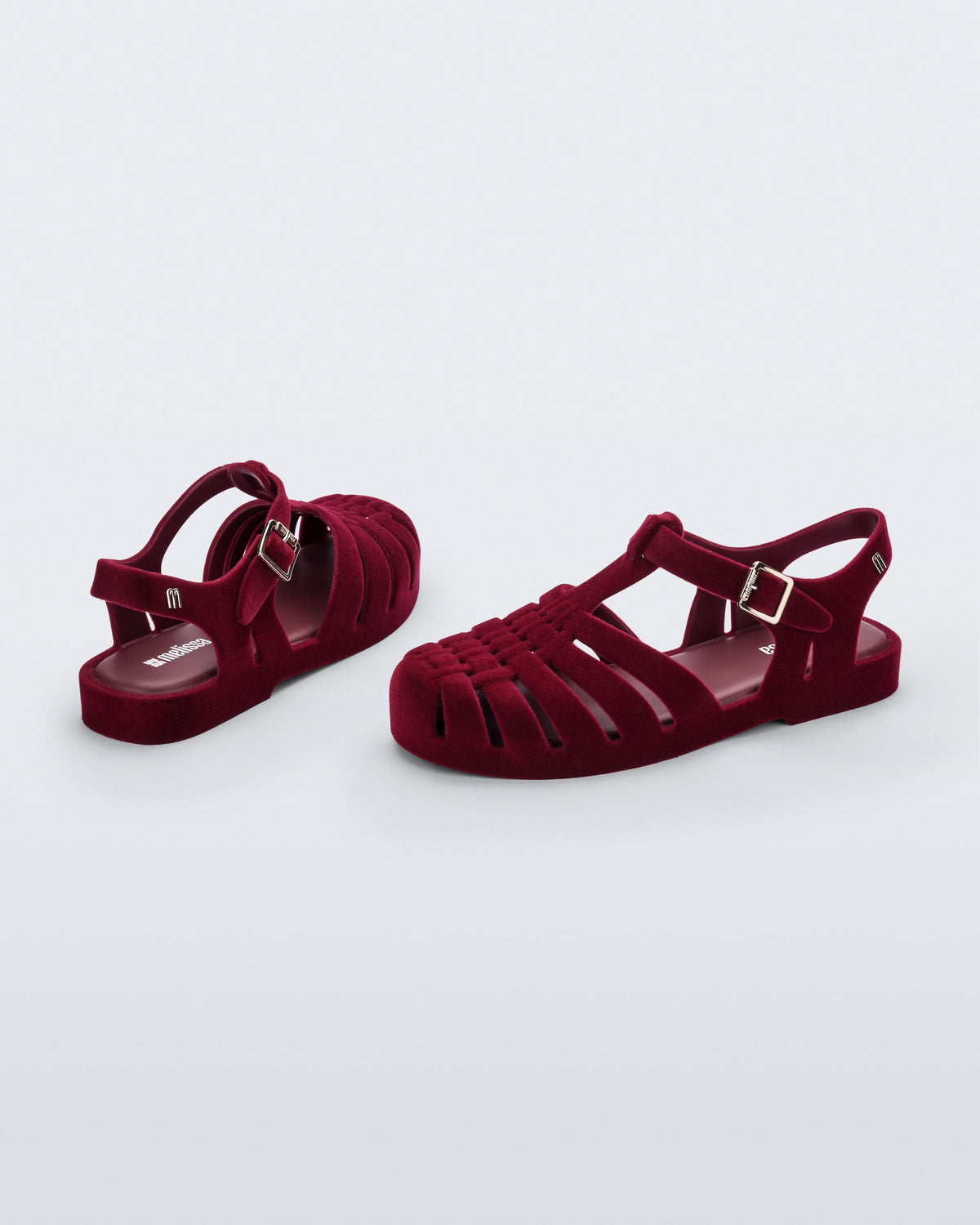 Side and back angled view of a pair of flocked red Possession Velvet fisherman sandals