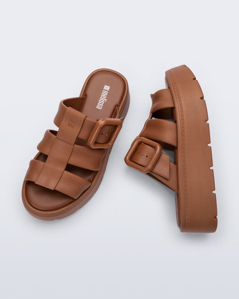 Top and side view of a pair of brown  Pump Platform sandals