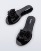 Top view of a pair of black Babe Petals slide sandals