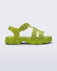 Side view of a green Ella sandal