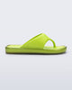 Side view of a green Float flip flop