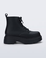 Side view of a matte black Coturno Soft Platform boot
