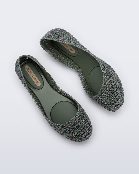 Top and side angled view of a pair of green glitter Campana flats