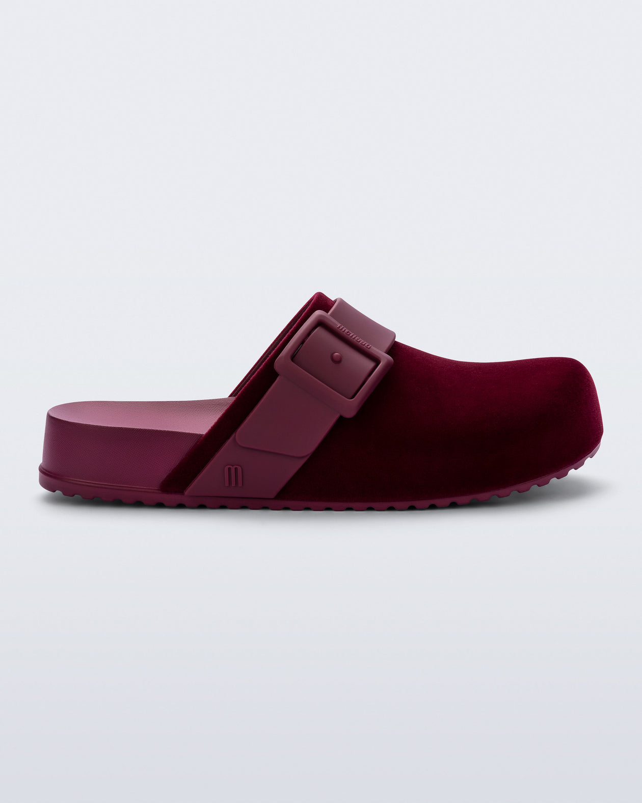 Side view of a red Cozy Clog Velvet slides