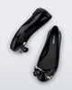 Top and side view of a pair of black Sweet Love Glam kids ballerina flats with bow