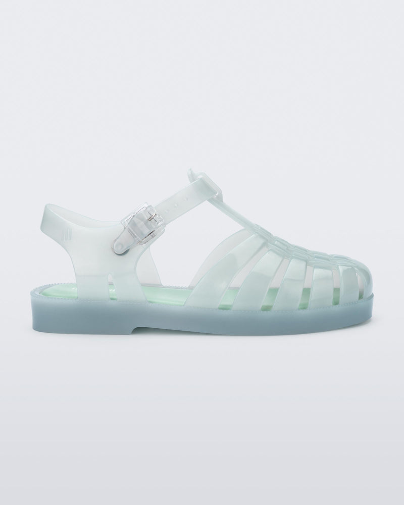 Side view of a light green kids Possession sandal