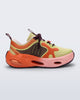 Side view of an orange/green/pink X Loop sneaker