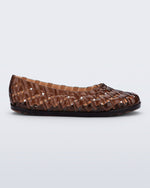 Side view of a brown Possession Ballerina flat