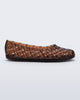 Side view of a brown Possession Ballerina flat