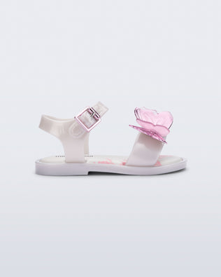 Side view of a pearly white baby Butterfly Sandals with pink butterfly