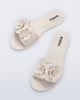 Top view of a pair of beige Babe Petals slide sandals