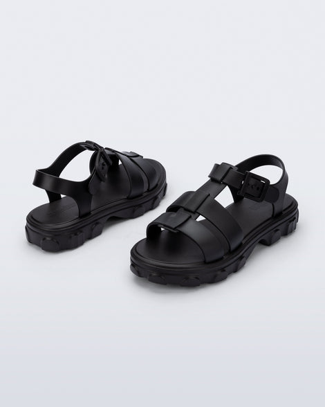 Back and angled view of a pair of black Ella sandals