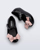Top and side view of a pair of black Ultragirl Classy baby ballerina flats with pink bow