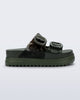 Side view of a dark green Cozy Platform slide with two straps with buckles