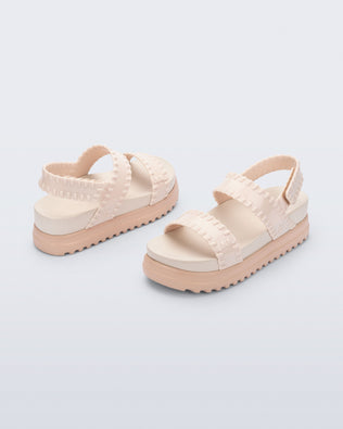 Back and angled view of a pair of beige Dune Platform Sandals with faux stitching on the straps