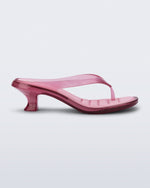 Side view of a pink Flip Flop Kitten Heel with clear pink straps