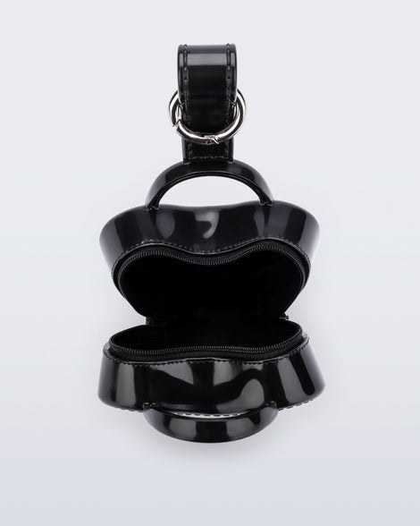 Top view of a black Heartbeat Pocket bag charm