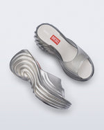Side and top view of a pair of clear silver Quantum Platform sandals