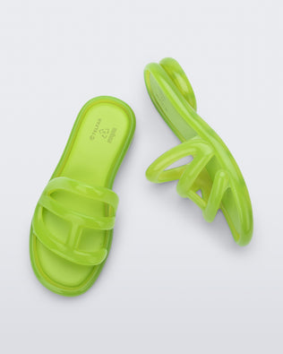 Top and side view of a pair of green Jelly Slide x Telfar.
