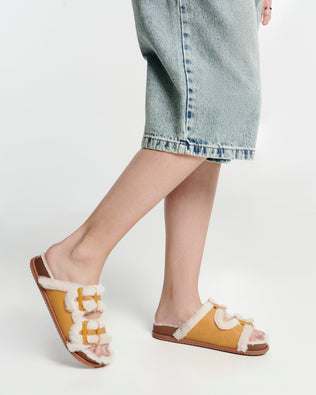 Product element, title Cozy Warm Slide in Orange/Beige
 price $99.00