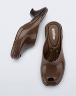 Top and side view of a pair of brown Gaia kitten heels with peep toe