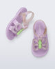 Side and angled view of a pair of lilac Hip Butterfly baby sandals