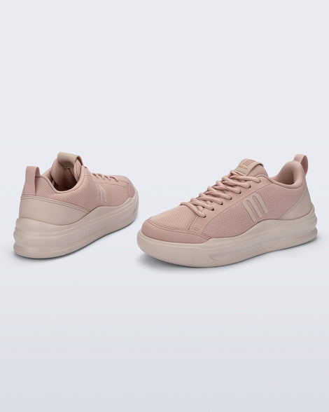 Back and angled view of a pair of pink X Mood sneakers