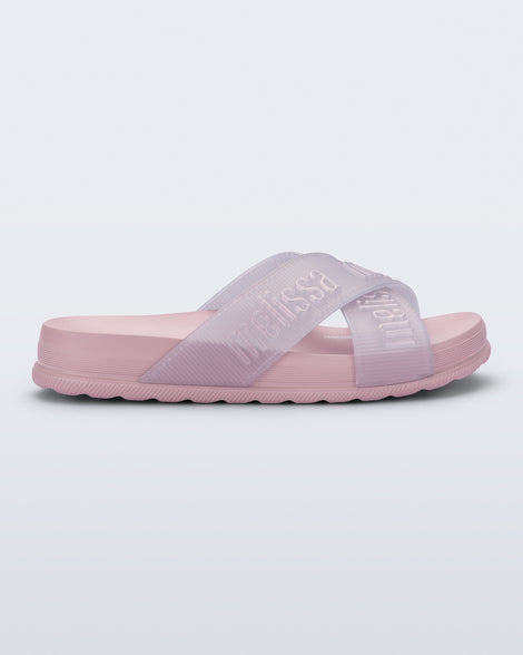 Side view of a light pink Cozy M Lover Slide with Melissa on the upper