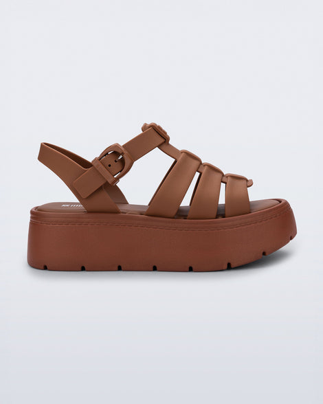 Side view of a brown Up Platform sandal