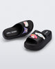 Top and angled view of a pair of black Hello Kitty + Friends Free Platform with Hello Kitty and Friends on upper