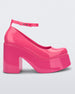 Side view of a pink Doll Heel women's platform shoe.