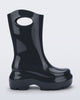 Side view of a grey Ultra platform rain Boot with circle cutout on top