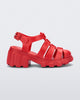 Side view of a red kids Megan heeled sandal