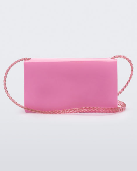 Back view of the Melissa party handbag in pink with braided strap.