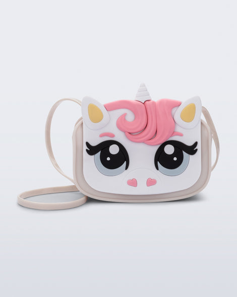 Front view of a beige Dreamy Unicorn kids bag with a unicorn face on front with pink hair