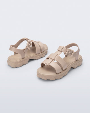Back and angled view of a pair of beige Ella sandals