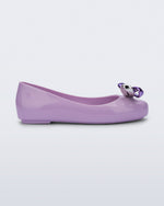 Side view of a purple Sweet Love Glam kids ballerina flats with bow
