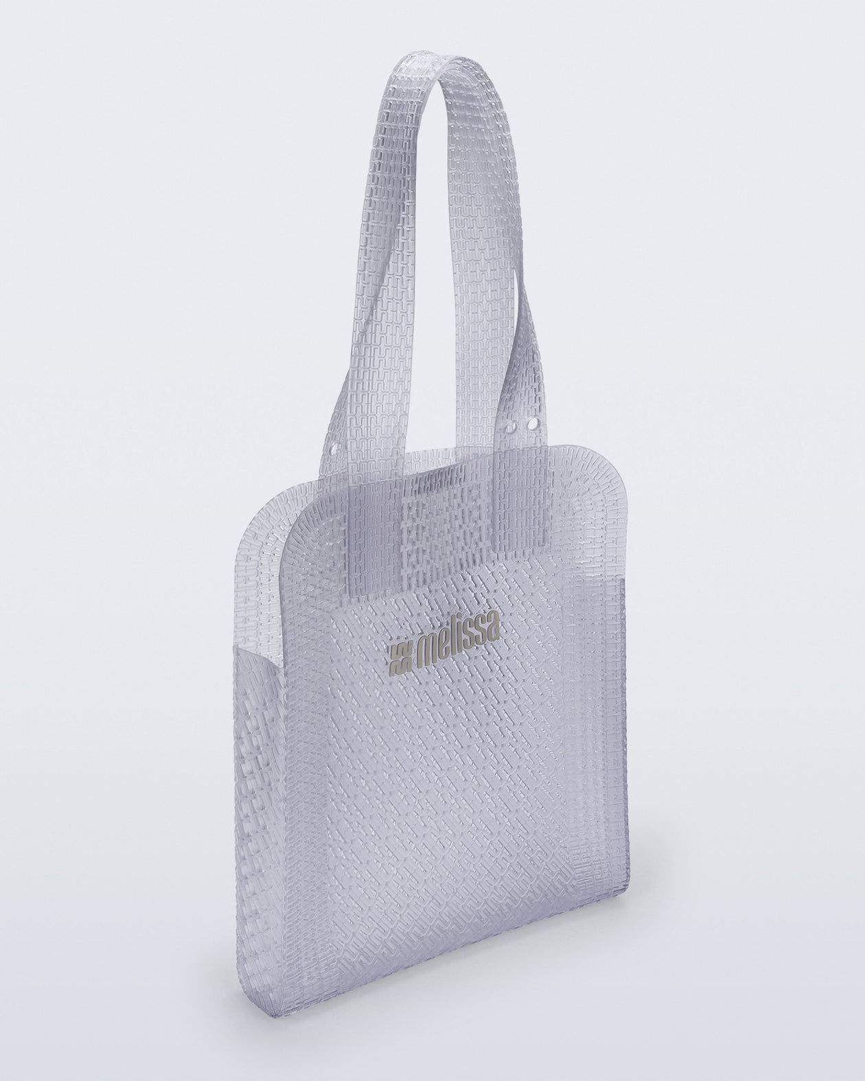 Angled view of a clear Harper bag with shoulder straps