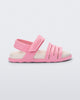 Side view of a pink with white insole Kaiteki baby sandal