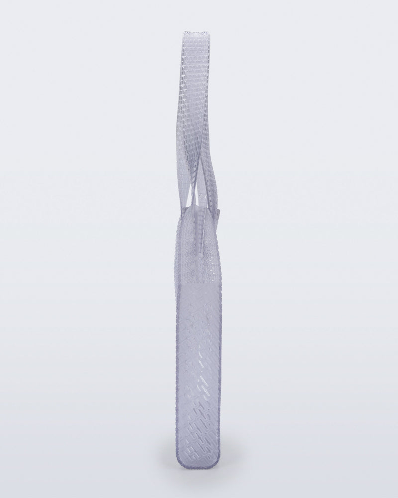 Side view of a clear Harper bag with shoulder straps
