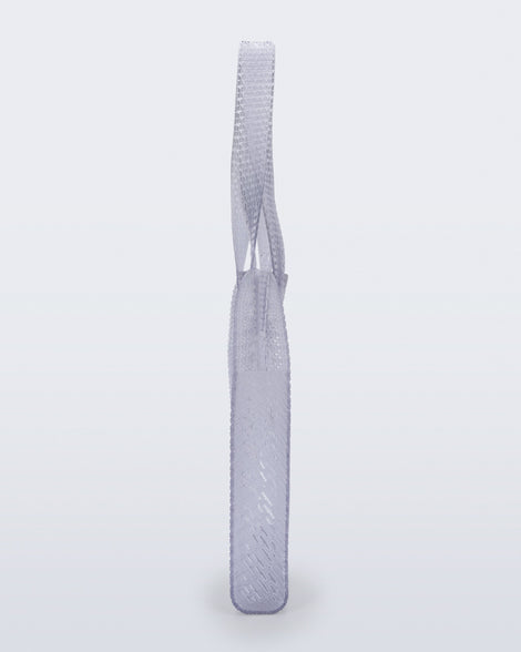 Side view of a clear Harper bag with shoulder straps