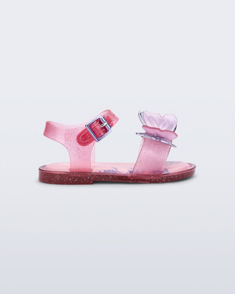 Side view of a glitter pink baby Butterfly Sandals with pink butterfly