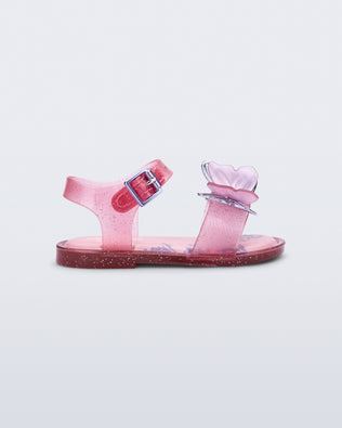 Side view of a glitter pink baby Butterfly Sandals with pink butterfly