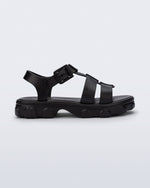 Side view of a black Ella sandal