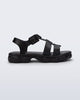 Side view of a black Ella sandal