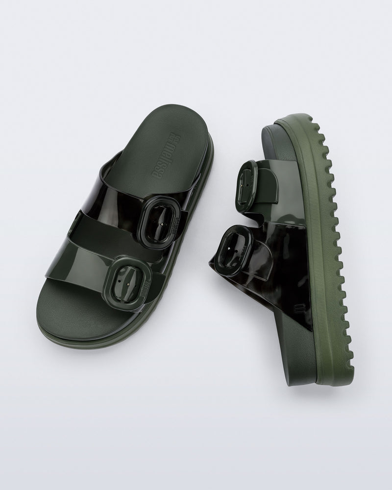 Top and side view of a pair of dark green Cozy Platform slides with two straps with buckles