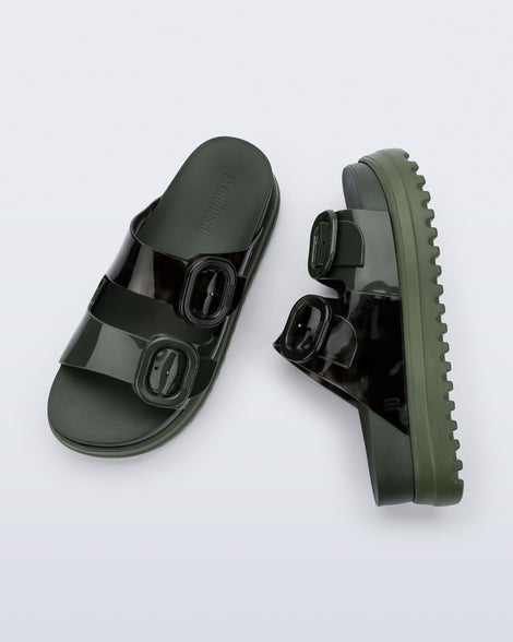 Top and side view of a pair of dark green Cozy Platform slides with two straps with buckles